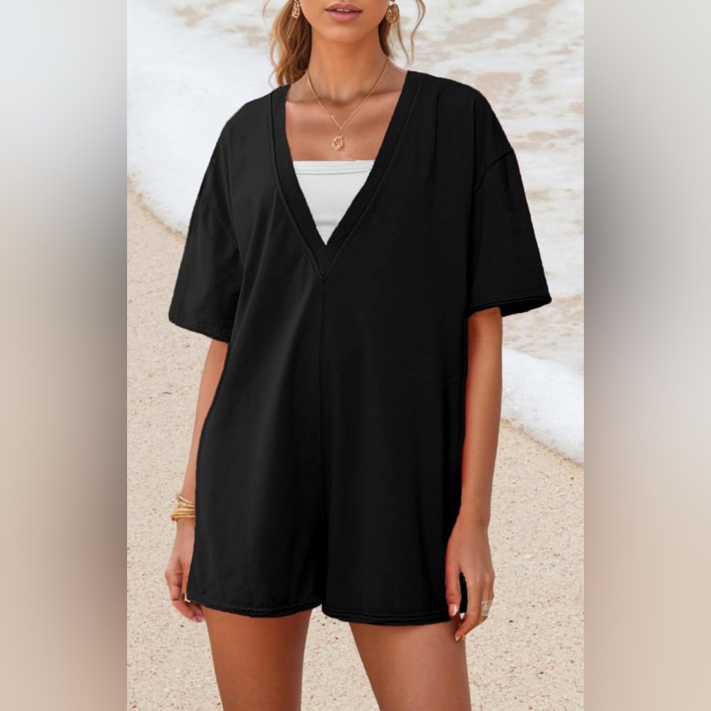 Brand new reversable black romper onsie  with pockets
